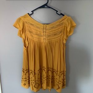 Yellow short sleeve blouse